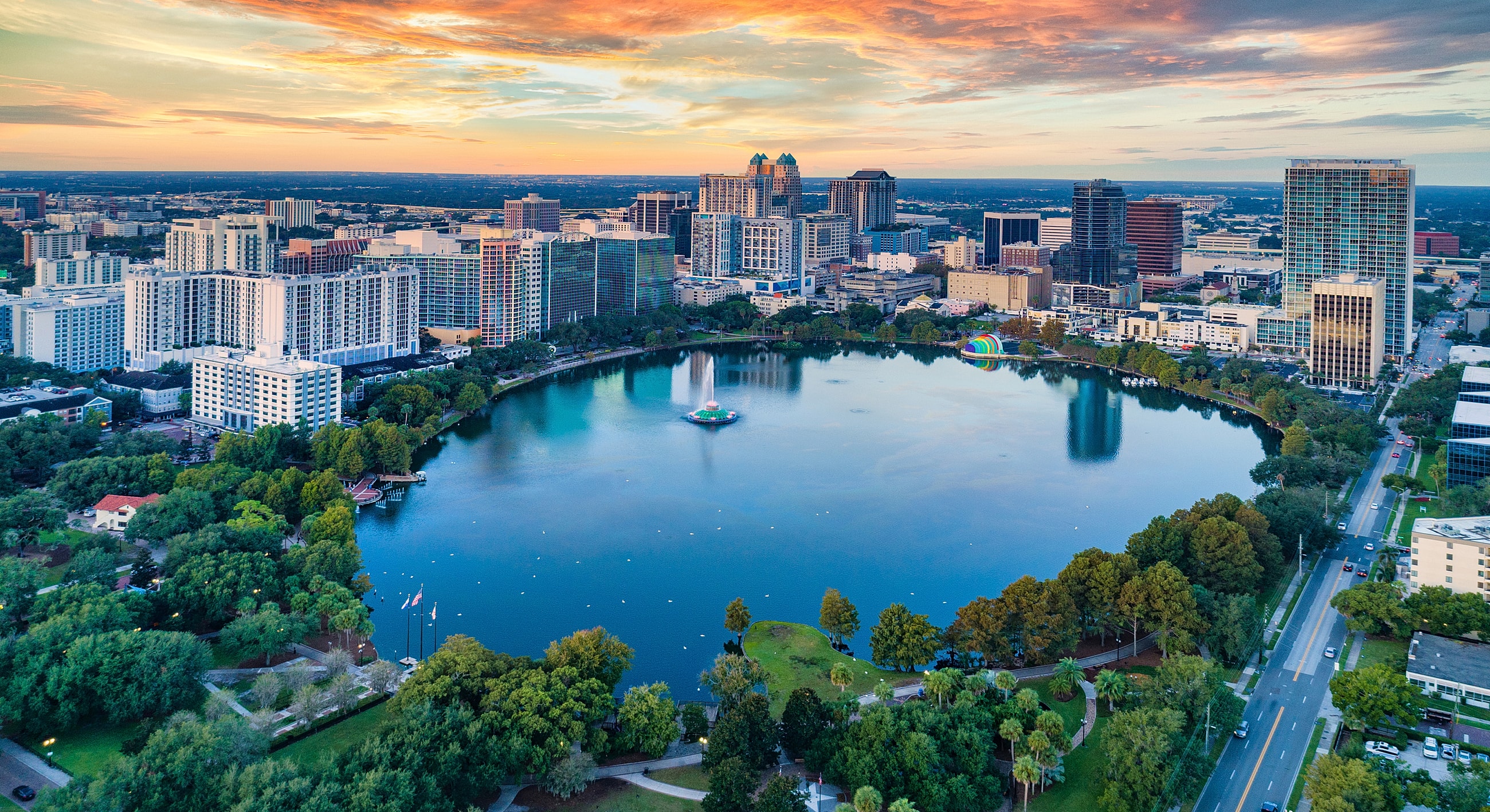 Orlando skyline and lake at sunset.
